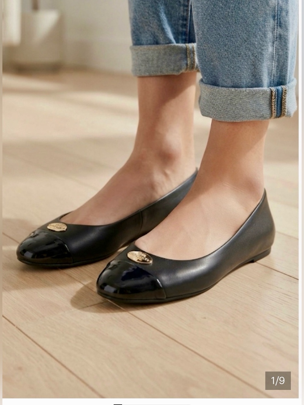 Coach Black Leather Ballet
Flats with Patent Black Toe and Gold Logo. Sz: 7B